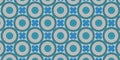 a blue and gray pattern with circles and flowers