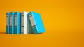 Blue and gray ring binders on a yellow background Royalty Free Stock Photo