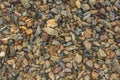 A blue gray yellow red stones of different sizes. natural surface texture Royalty Free Stock Photo