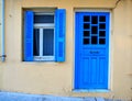 Blue Greek Shutters Window And Door In Old House