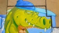 An Alligator Graffiti on a Cement Wall