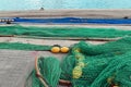 Blue and green traditional fishing nets in harbour in Mahon, Menorca Royalty Free Stock Photo