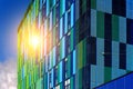 Blue-green glass commercial facade with sunlight Royalty Free Stock Photo