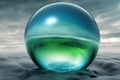 Blue Green Glass Orb on surreal atmosphere Royalty Free Stock Photo