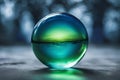 Blue Green Glass Orb on surreal atmosphere Royalty Free Stock Photo