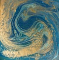 Blue, green and gold liquid texture. Hand drawn marbling background. Ink marble abstract pattern