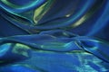 Blue, green and gold silk fabric texture background Royalty Free Stock Photo