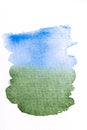 Blue and green gradient watercolor brush strokes on white rough