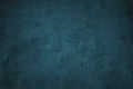 Blue green grunge background. Dark abstract rough background. Toned concrete wall texture. Combination of teal color and grunge te Royalty Free Stock Photo