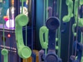 Blue and green hanging foam novelty telephone receivers Royalty Free Stock Photo