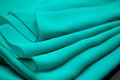 Blue, green, marine silk tender colored textile, elegance rippled material Royalty Free Stock Photo
