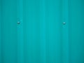 Texture blue green metal sheet wall material bolt Royalty Free Stock Photo