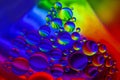 Oil drops macro colourful background Royalty Free Stock Photo