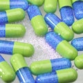 Blue and green pills