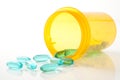 Blue Green Pills with Prescription Bottle Royalty Free Stock Photo