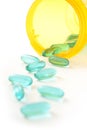 Blue Green Pills with Prescription Bottle Royalty Free Stock Photo