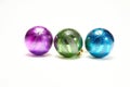 Blue, green and purple Christmas balls on a white background, New Year, Christmas toys, holiday, Christmas. Royalty Free Stock Photo