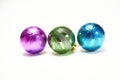 Blue, green and purple Christmas balls on a white background, New Year, Christmas toys, holiday, Christmas. Royalty Free Stock Photo