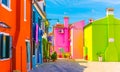 Blue, green and purple house facade in the island of Burano, Venice