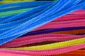 Blue,Green,Purple,Orange,Pink and Yellow pipe cleaners background Royalty Free Stock Photo