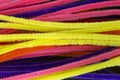 Blue,Green,Purple,Orange,Pink and Yellow pipe cleaners background Royalty Free Stock Photo