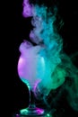 Blue - green - purple smoke in the glass. Halloween. Royalty Free Stock Photo