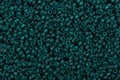 Blue-green seed beads background. Royalty Free Stock Photo