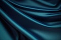 blue and green silk satin soft wavy folds shiny silky fabric dark teal color elegant background Royalty Free Stock Photo