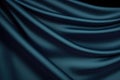 blue and green silk satin soft wavy folds shiny silky fabric dark teal color elegant background Royalty Free Stock Photo