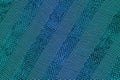 Blue and green sparkle ribbon weave textured background