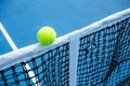 Blue and green tennis court surface,Tennis ball on the field Royalty Free Stock Photo