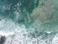 blue and green waves crashing against the reef making a beautiful natural pattern Royalty Free Stock Photo