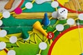 Blue, green and yellow plastic chips and dice in old Board games for children Royalty Free Stock Photo