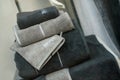 Blue and grey bath towels pile fromn Hugo Boss brand in store showroom Royalty Free Stock Photo