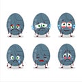 Blue Grey easter egg cartoon character with sad expression Royalty Free Stock Photo