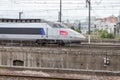 Blue and grey high-speed train on an urban background SNCF Royalty Free Stock Photo