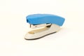 Blue and grey stapler office supplies close up isolated on the white background Royalty Free Stock Photo