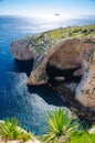 Blue grotto arch on Malta island and Filfla, Mediterranean sea Royalty Free Stock Photo