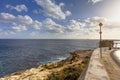 Blue Grotto area in Malta, Europe, with a road and a broken street sign on the right Royalty Free Stock Photo