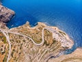 Blue Grotto in Malta. Pleasure boat with tourists runs. Natural arch window in rock. Aerial top view. Royalty Free Stock Photo