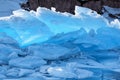 Blue growler piece of iceberg with reflection in calm water. Arctic ocean Royalty Free Stock Photo