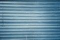 Blue grunge lined metal wall, background or texture