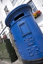 Blue Guernsey Post Box unique to Guernsey in the town of St Pierre Port St Peter Port, the main settlement of Guernsey, The Royalty Free Stock Photo