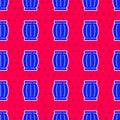 Blue Gun powder barrel icon isolated seamless pattern on red background. TNT dynamite wooden old barrel. Vector Royalty Free Stock Photo