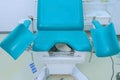 Blue gynecological chair in medical office in clinic. Royalty Free Stock Photo