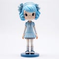 Blue Hair Anime Figure Doll: Monochromatic Depth And Cartoonish Charm