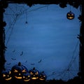 Blue Halloween background with pumpkins