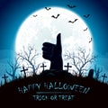 Blue Halloween background with thumb up on cemetery