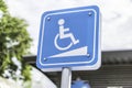 Blue Handicap at parking car sign outdoors for Disabled, Wheelchair or elder old or cannot self help people Royalty Free Stock Photo