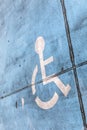 Blue handicap sign at a parking lot Royalty Free Stock Photo